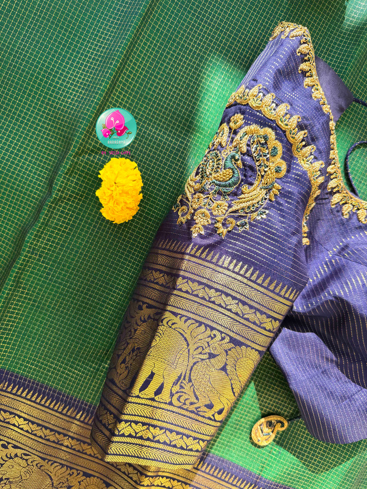 Peacock Splendor: Emerald Green Vaira Oosi Kanchipattu Silk Saree & Royal Blue Maggam Blouse