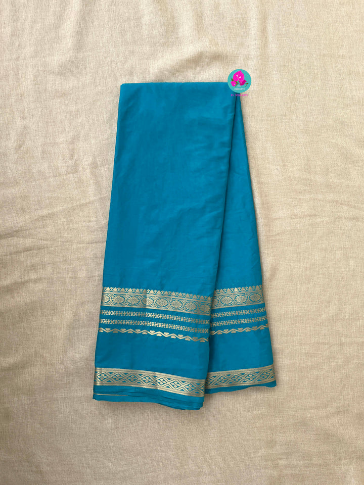 Blue Semi Crape Silk Saree with zari border