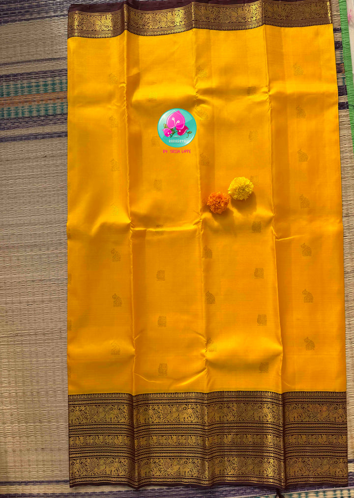 Sacred Earth & Radiant Haldi: Yellow 2G Pure Kanchipattu Silk Saree & Earthen Brown Maggam Blouse