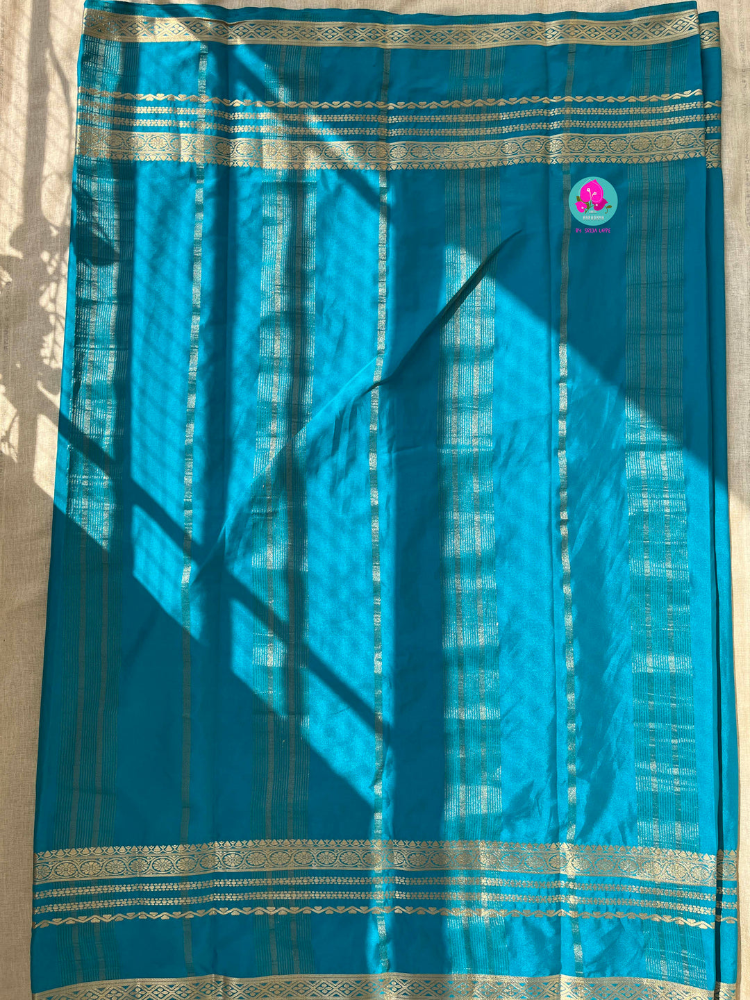Blue Semi Crape Silk Saree with zari border
