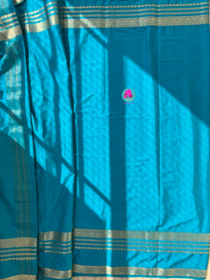 Blue Semi Crape Silk Saree with zari border