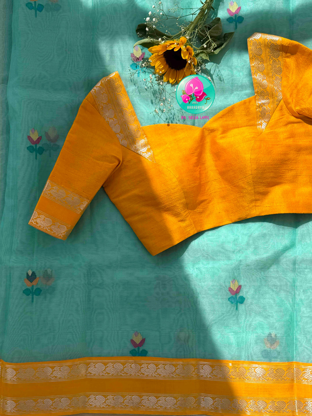 Ethereal Aquamarine & Mustard Fusion: Blue Jamdani-Kanchiorganza Silk Saree with Mustard Silk Blouse
