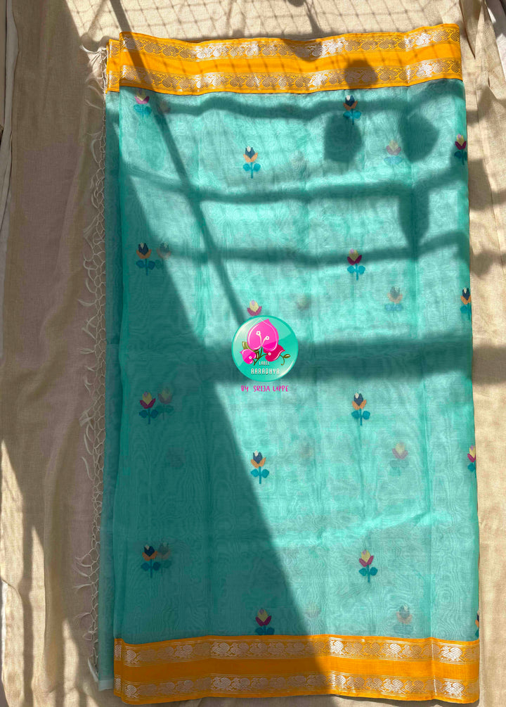 Ethereal Aquamarine & Mustard Fusion: Blue Jamdani-Kanchiorganza Silk Saree with Mustard Silk Blouse