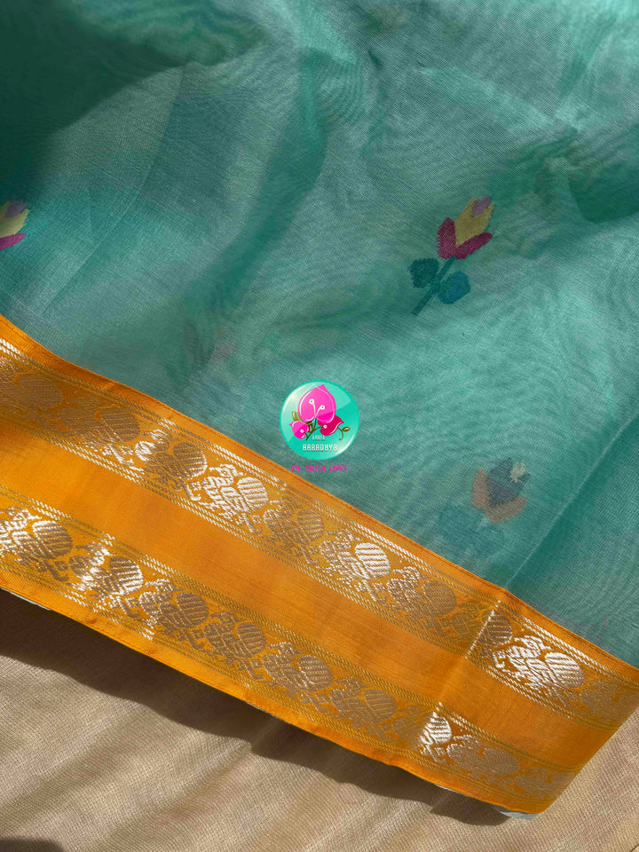 Ethereal Aquamarine & Mustard Fusion: Blue Jamdani-Kanchiorganza Silk Saree with Mustard Silk Blouse