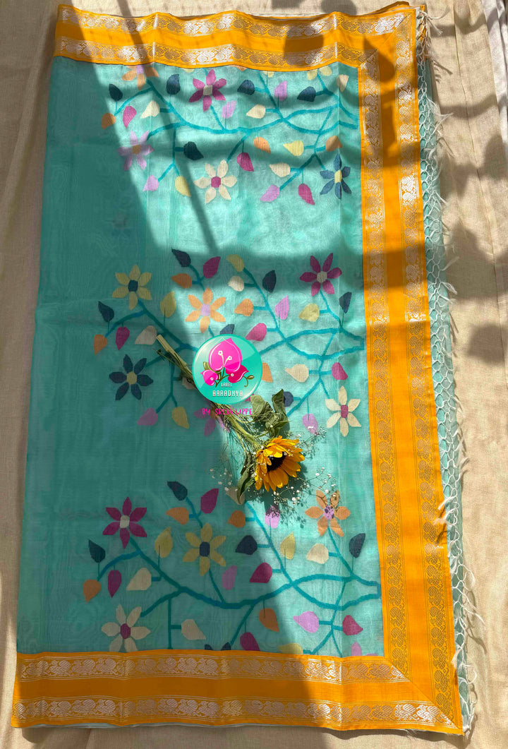 Ethereal Aquamarine & Mustard Fusion: Blue Jamdani-Kanchiorganza Silk Saree with Mustard Silk Blouse