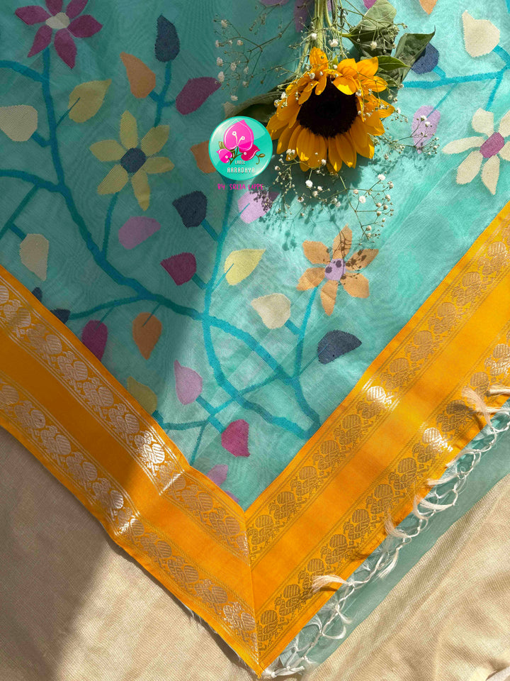 Ethereal Aquamarine & Mustard Fusion: Blue Jamdani-Kanchiorganza Silk Saree with Mustard Silk Blouse