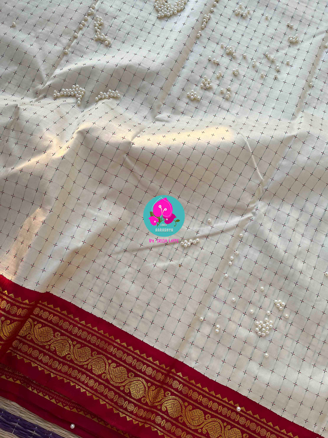 The Blessed Drape: Off-White Pure Kanchipattu Thalambralu Saree with Dual-Tone Pallu