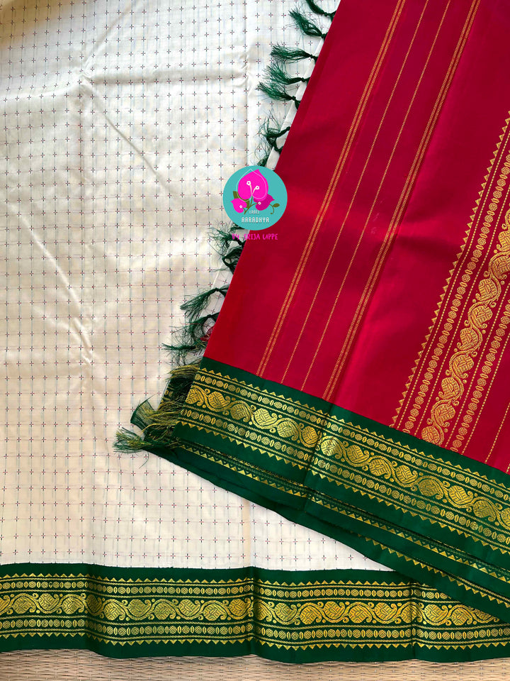 The Blessed Drape: Off-White Pure Kanchipattu Thalambralu Saree with Dual-Tone Pallu