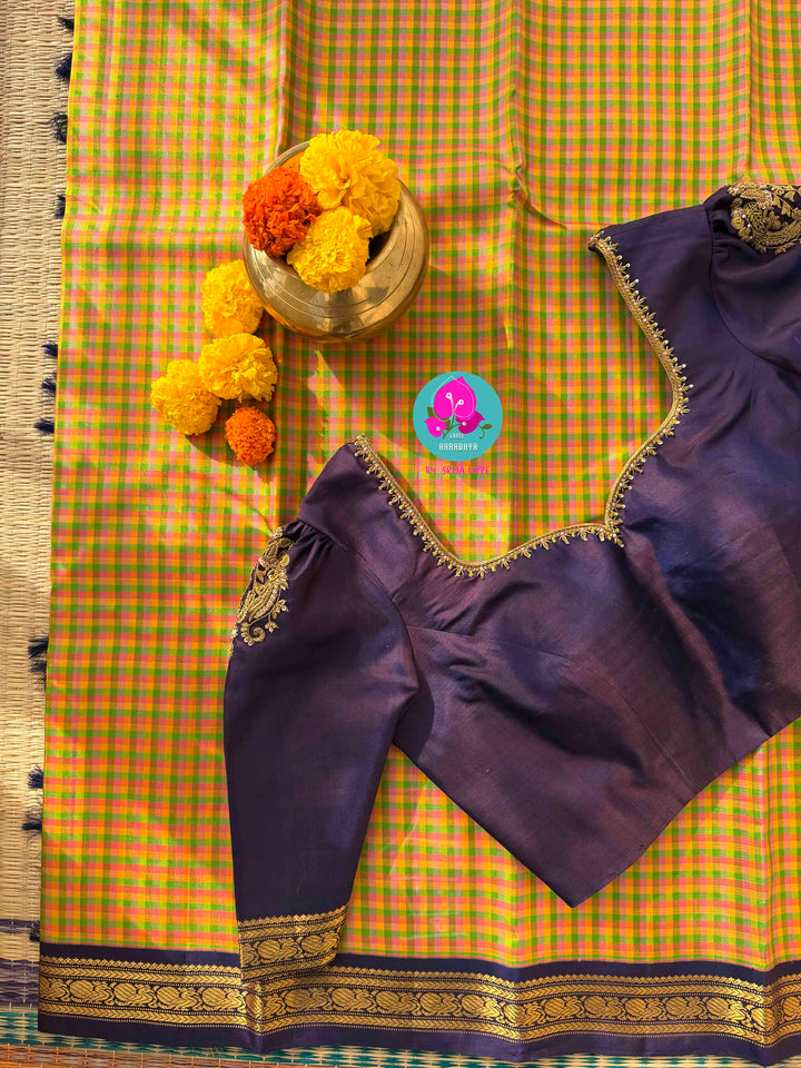 A Kaleidoscope of Tradition: Vintage Madras Checks Kanchipuram with Artisan Maggam Blouse