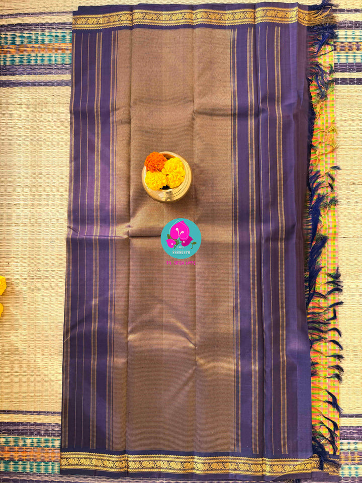 A Kaleidoscope of Tradition: Vintage Madras Checks Kanchipuram with Artisan Maggam Blouse