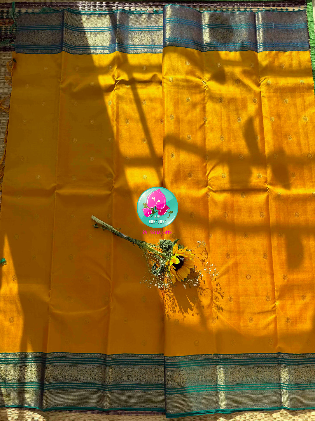 Vintage Radiance & Peacock Jewel: Mustard Yellow Pure Kanjeevaram Saree with Peacock Blue-Green Border