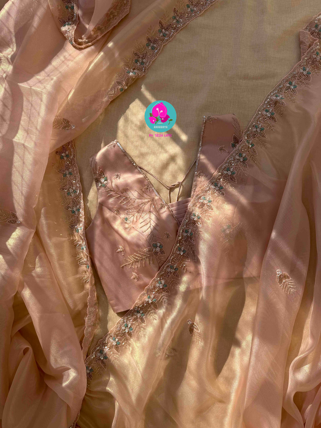 Nectar & Moonlight: Hand-Embroidered Peach & Rose Gold Tissue Saree
