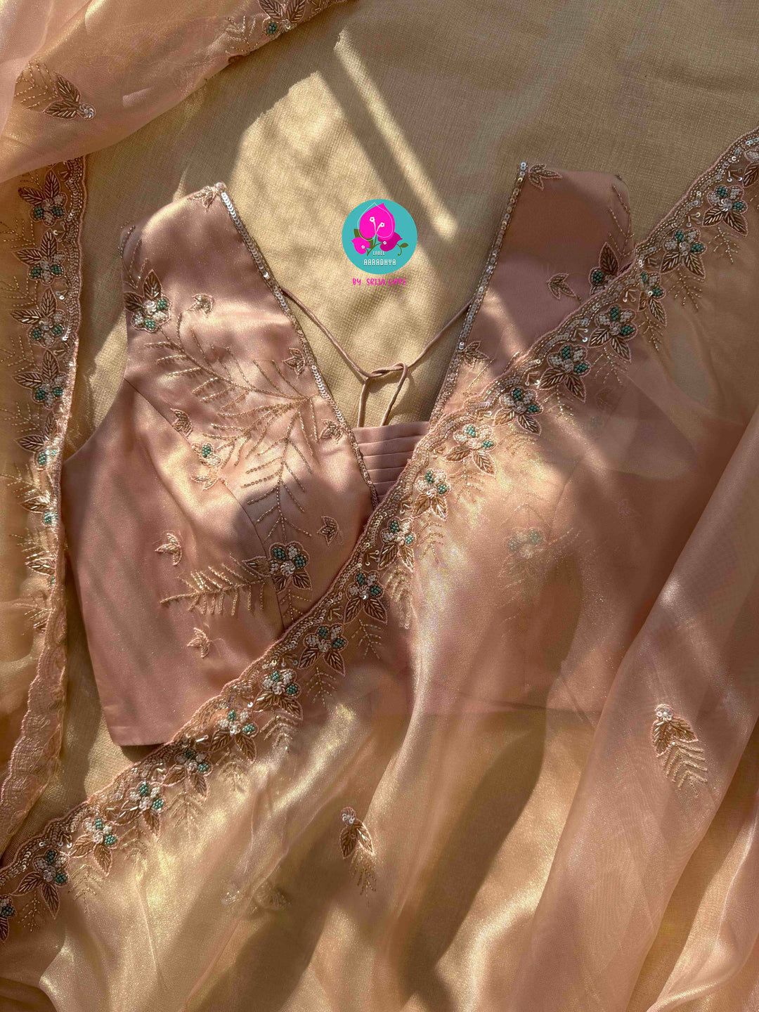 Nectar & Moonlight: Hand-Embroidered Peach & Rose Gold Tissue Saree