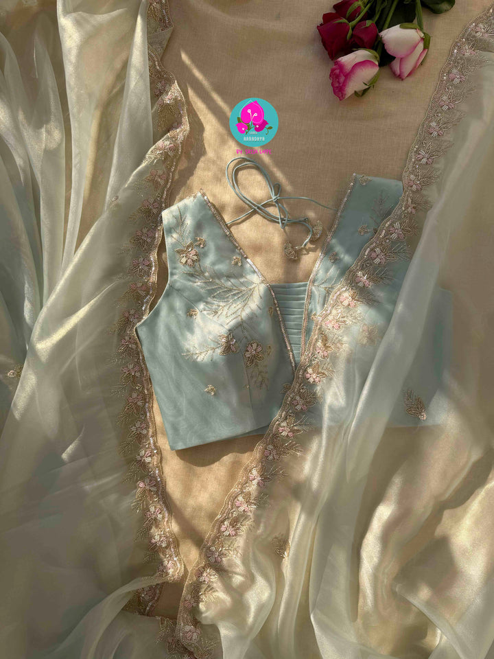 Cerulean Frost & Silver Mist: Hand-Embroidered Light Pastel Blue Tissue Saree