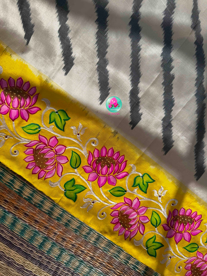 A Heritage Fusion: Hand-Painted Tanjore Lotus Pure Ikkat Silk Saree