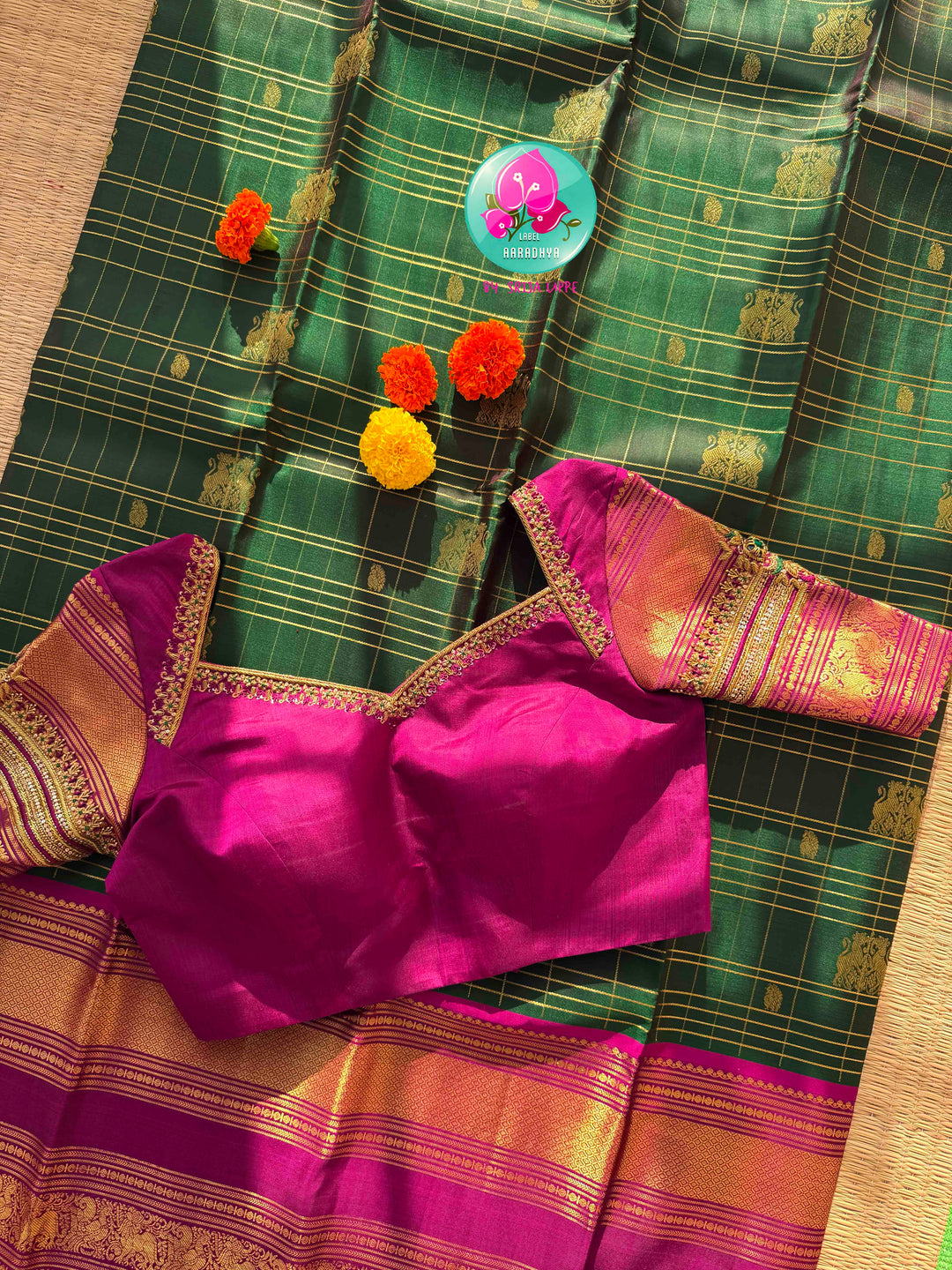Majestic Heritage Classic: Bottle Green Kanchipattu Silk Saree with Magenta Pink Korvai Border & Maggam Blouse
