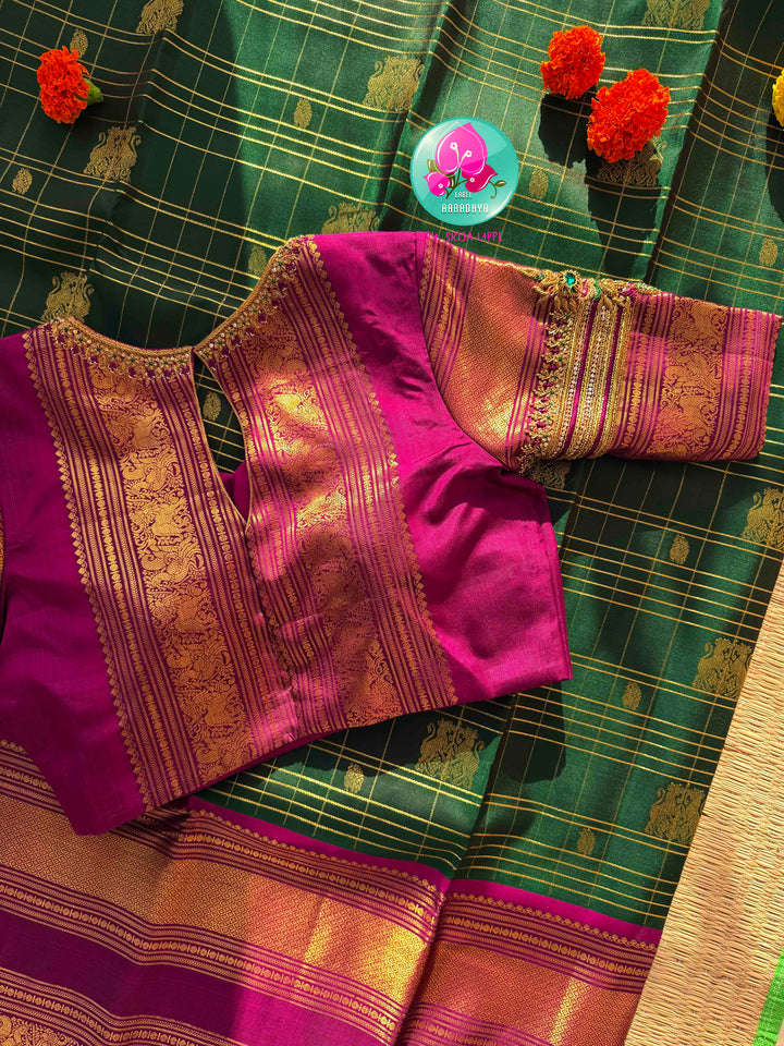 Majestic Heritage Classic: Bottle Green Kanchipattu Silk Saree with Magenta Pink Korvai Border & Maggam Blouse
