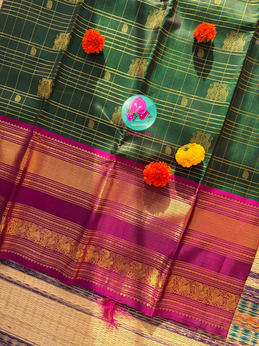 Majestic Heritage Classic: Bottle Green Kanchipattu Silk Saree with Magenta Pink Korvai Border & Maggam Blouse