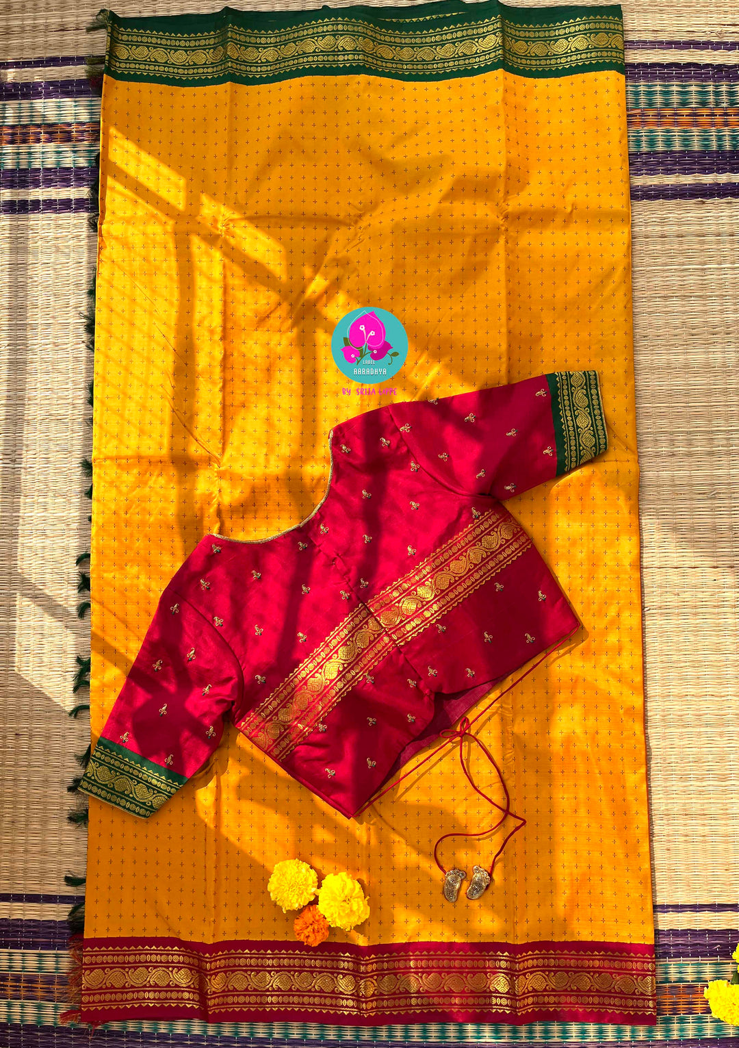 A Mother's Treasure: Festive Kanchipattu Silk with Unique Baby Feet Detailing