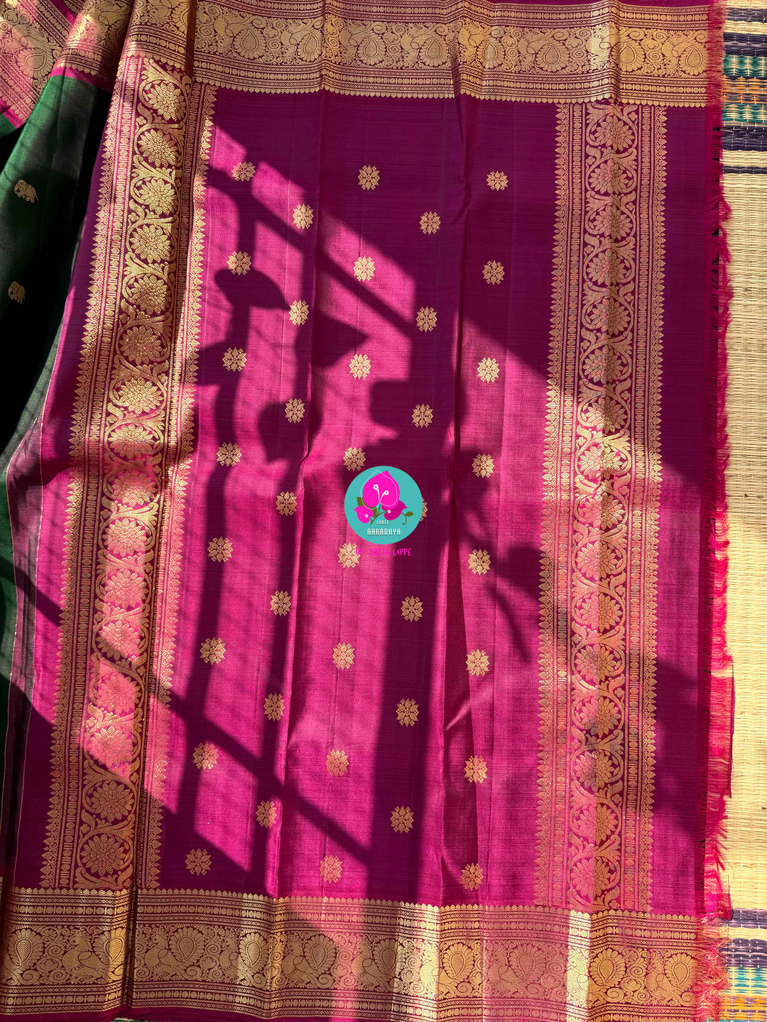 Vintage Majesty: Deep Bottle Green Pure Kanchipattu Saree with Hand-Woven Elephant Motifs & Magenta Glow