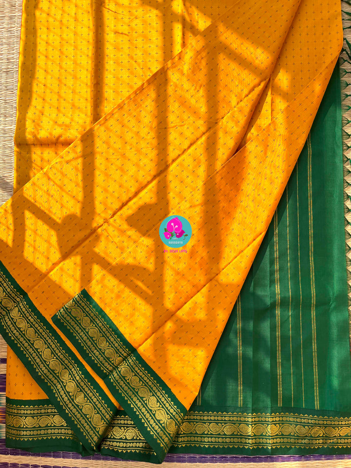 A Mother's Treasure: Festive Kanchipattu Silk with Unique Baby Feet Detailing