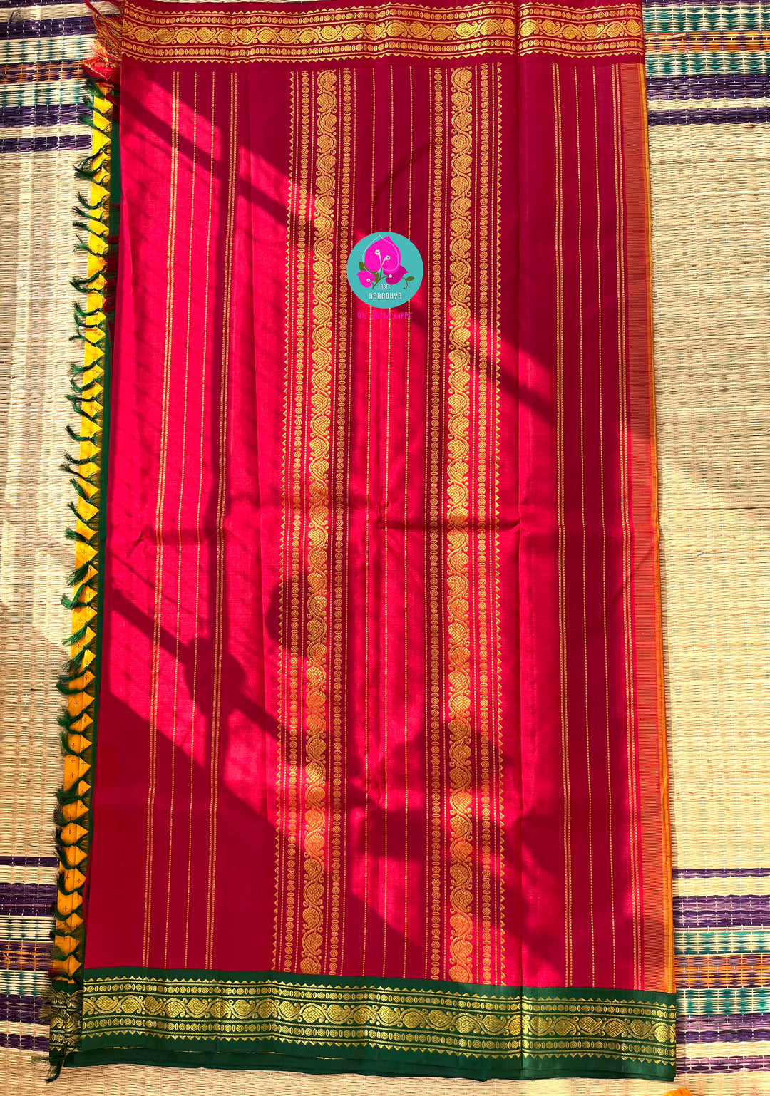A Mother's Treasure: Festive Kanchipattu Silk with Unique Baby Feet Detailing