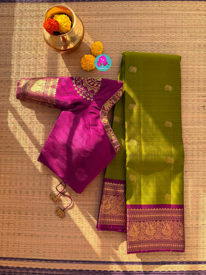 Vintage Grandeur: Deep Green Pure Kanchipattu with Hand-Woven Elephant Motifs & Radiant Magenta