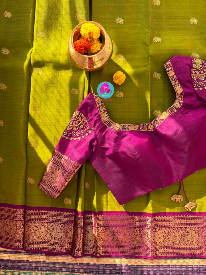 Vintage Grandeur: Deep Green Pure Kanchipattu with Hand-Woven Elephant Motifs & Radiant Magenta