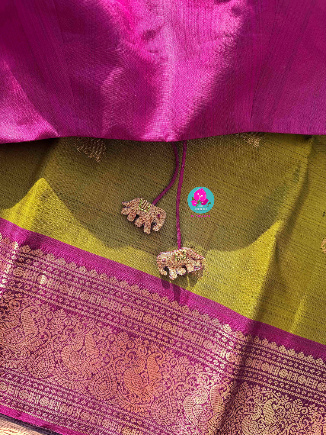 Vintage Grandeur: Deep Green Pure Kanchipattu with Hand-Woven Elephant Motifs & Radiant Magenta