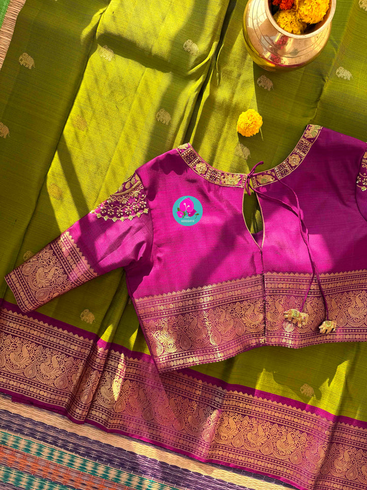 Vintage Grandeur: Deep Green Pure Kanchipattu with Hand-Woven Elephant Motifs & Radiant Magenta