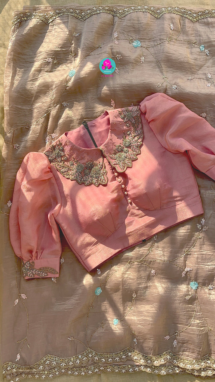Soft crushed organza hand embroidered saree paired with Hand Embroidered tissue silk blouse