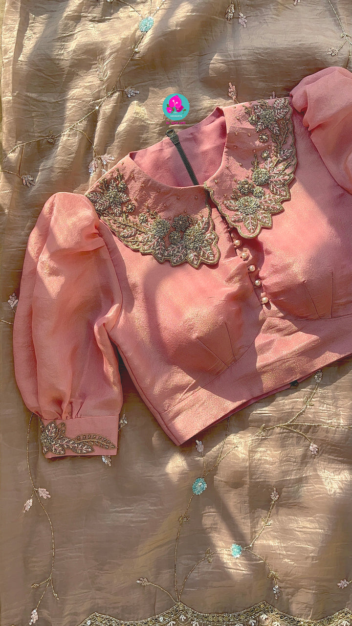 Soft crushed organza hand embroidered saree paired with Hand Embroidered tissue silk blouse