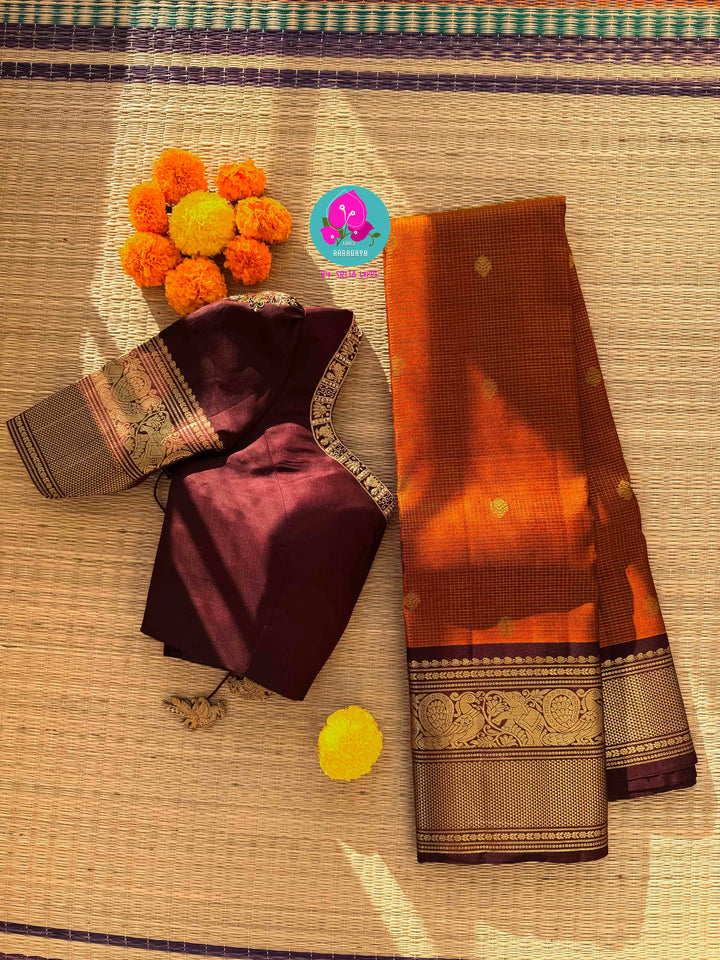 Deep Rust Kanchipuram Silk with Gilded Vaira Oosi & Hand-Embroidered Elegance