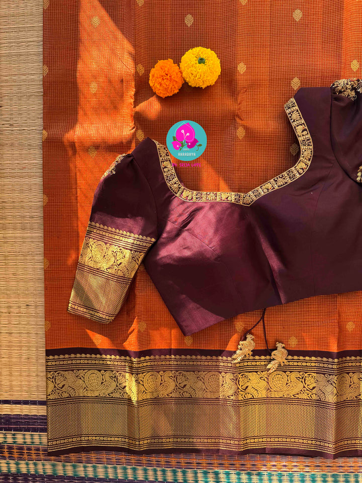 Deep Rust Kanchipuram Silk with Gilded Vaira Oosi & Hand-Embroidered Elegance