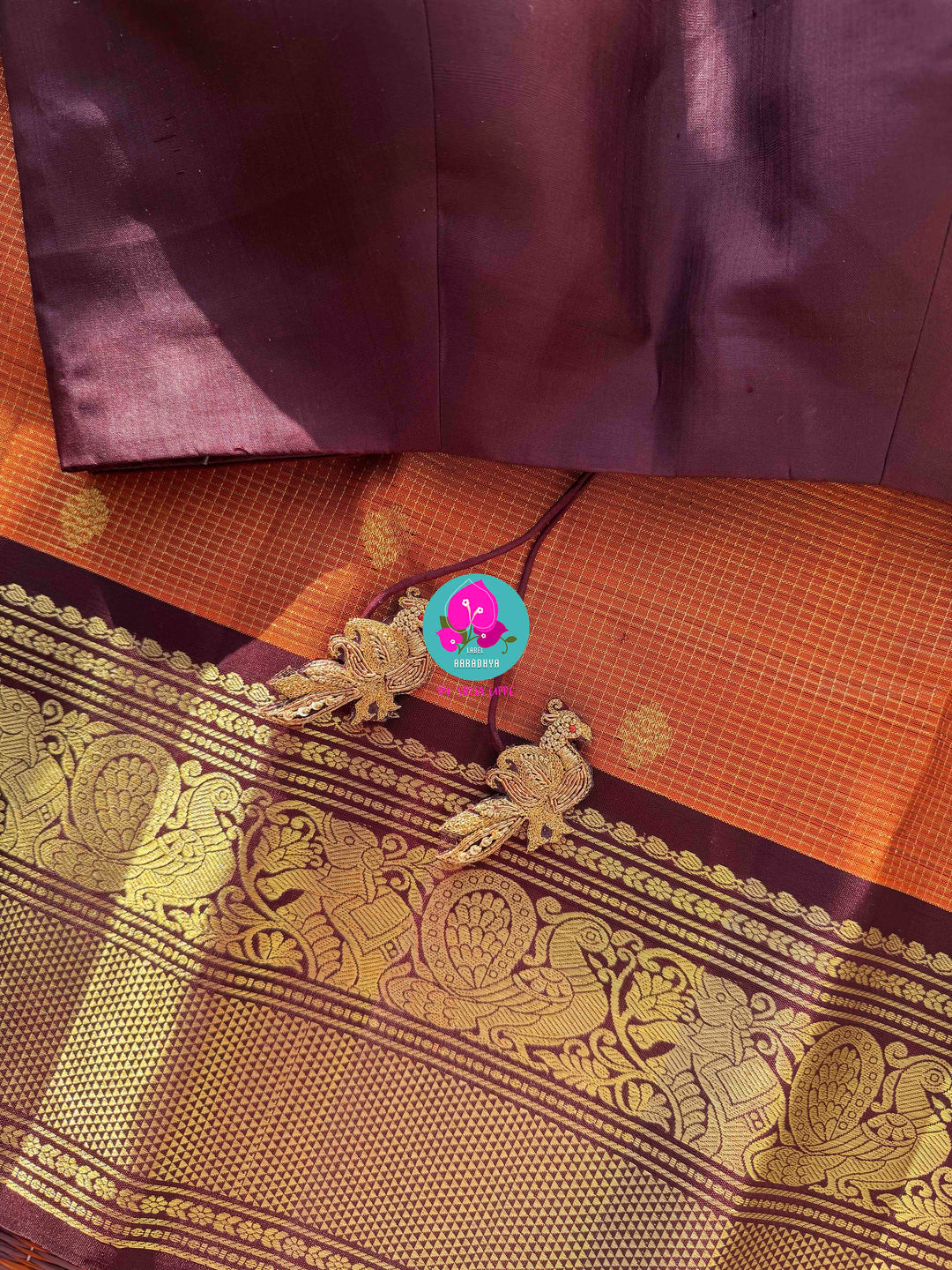 Deep Rust Kanchipuram Silk with Gilded Vaira Oosi & Hand-Embroidered Elegance