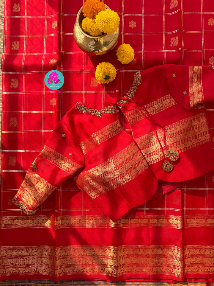 Eternal Radiance: Crimson Red Pure Kanchipattu with Gilded Zari & Hand-Embroidered Peacock Artistry