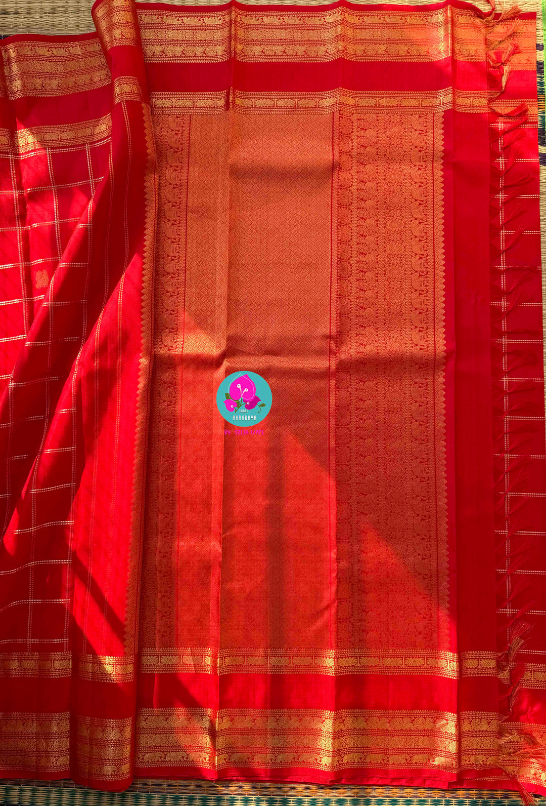 Eternal Radiance: Crimson Red Pure Kanchipattu with Gilded Zari & Hand-Embroidered Peacock Artistry