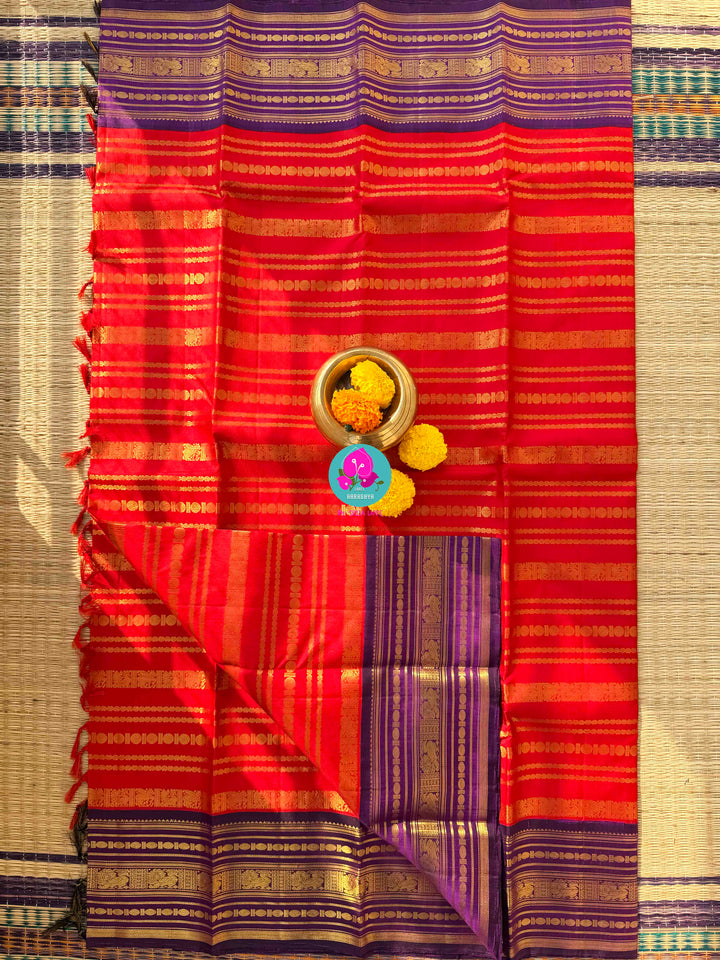 Vintage Majesty: Vibrant Red 2G Zari Kanchi Silk with Vaira Oosi Lines & Royal Purple Baldari Borders