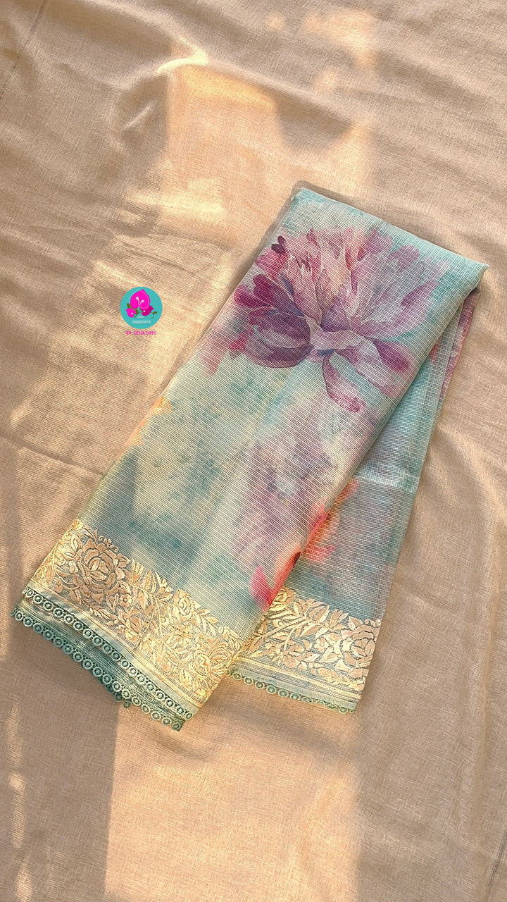 Kota silk saree in pretty floral design With embroidery at border