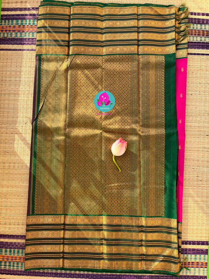 The Lotus Bloom: Tamara Pink Kanjivaram Saree with Contrast Green & Gold Mango Buttas