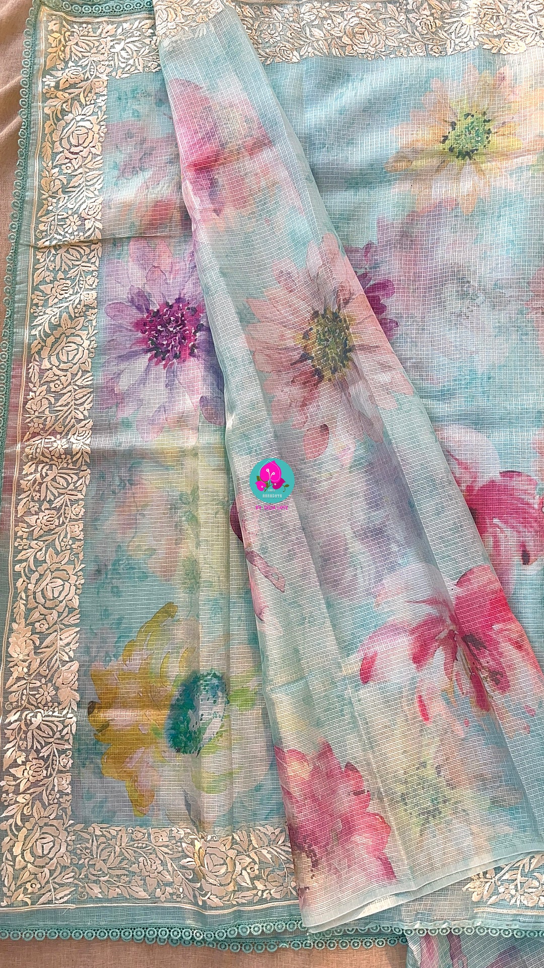 Kota silk saree in pretty floral design With embroidery at border