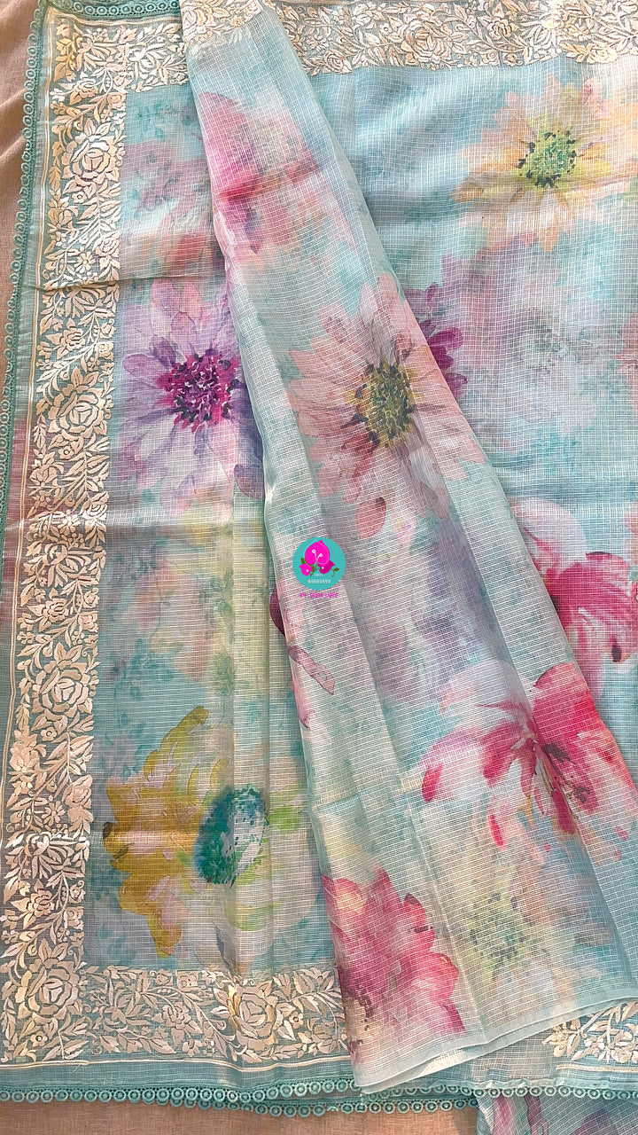 Kota silk saree in pretty floral design With embroidery at border