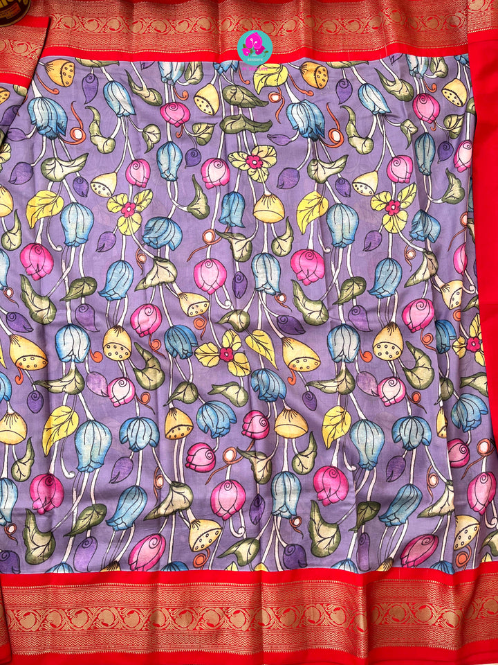 Kalamkari printed Pattu Saree with hand embroidered pure raw silk blouse