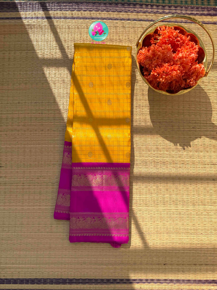 Luminous Tissue Radiance: Checkered Yellow 2G Tissue Kanchi Silk Saree with Vintage Magenta Pink Border