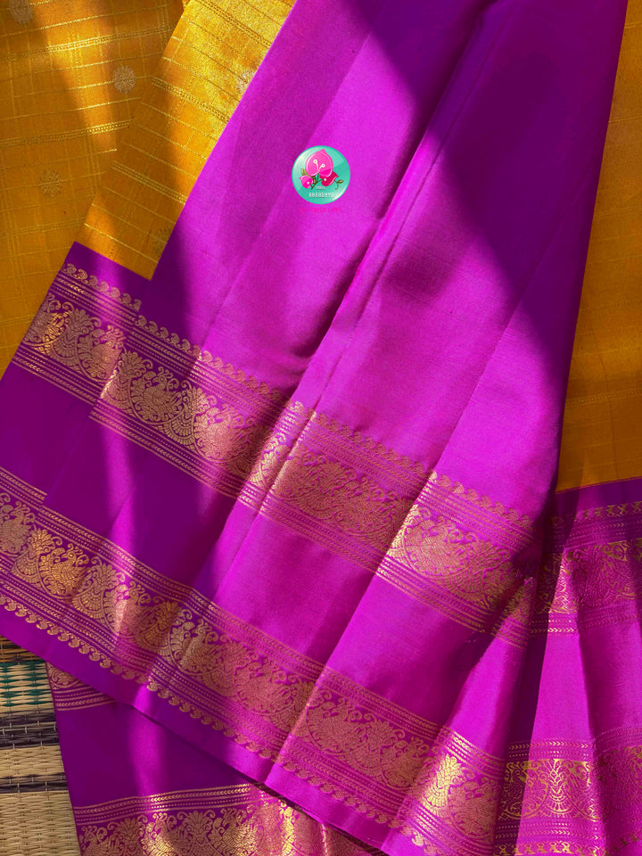 Luminous Tissue Radiance: Checkered Yellow 2G Tissue Kanchi Silk Saree with Vintage Magenta Pink Border