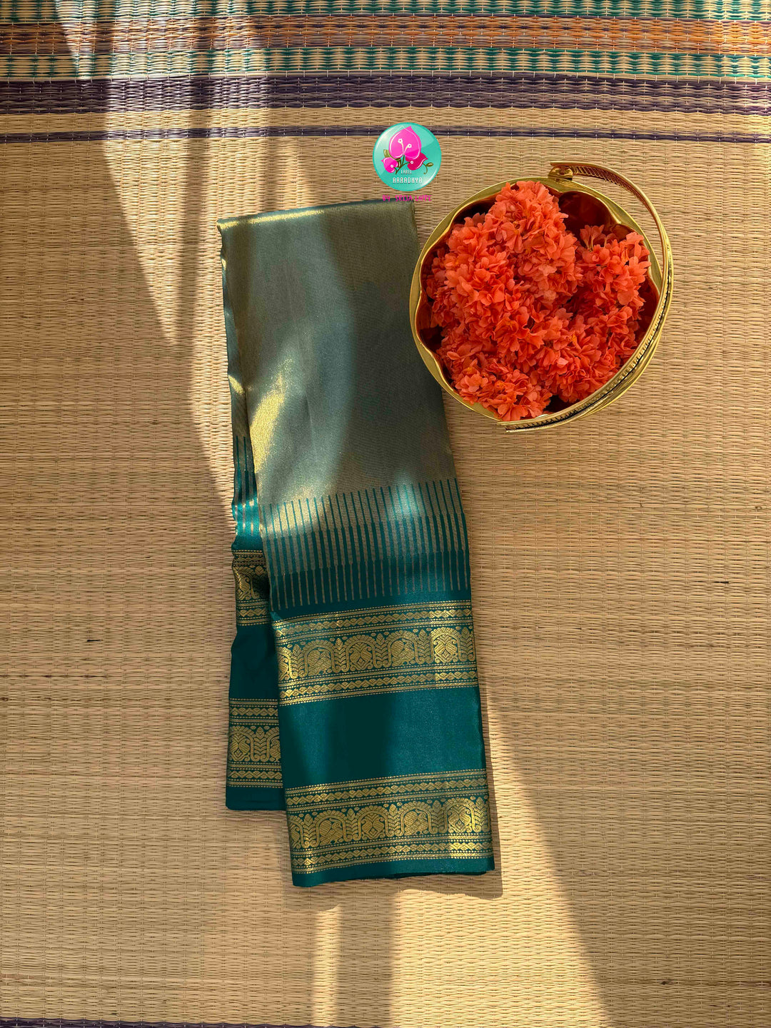 Jewel-Toned Metallic Grace: Teal Green 2G Pure Kanchipattu Tissue Saree with Traditional Gap Border