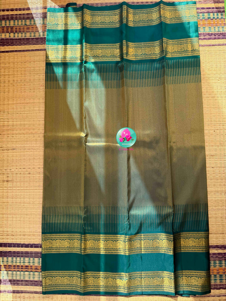 Jewel-Toned Metallic Grace: Teal Green 2G Pure Kanchipattu Tissue Saree with Traditional Gap Border