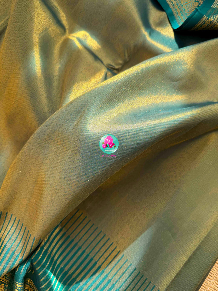 Jewel-Toned Metallic Grace: Teal Green 2G Pure Kanchipattu Tissue Saree with Traditional Gap Border