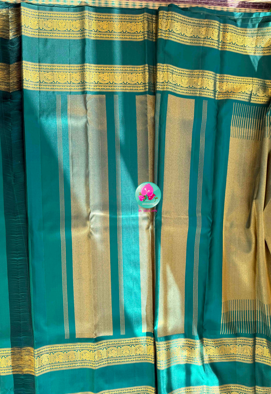 Jewel-Toned Metallic Grace: Teal Green 2G Pure Kanchipattu Tissue Saree with Traditional Gap Border