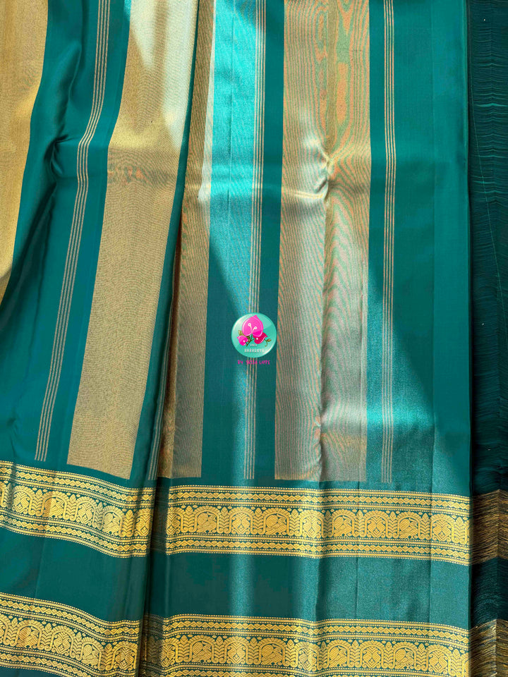 Jewel-Toned Metallic Grace: Teal Green 2G Pure Kanchipattu Tissue Saree with Traditional Gap Border